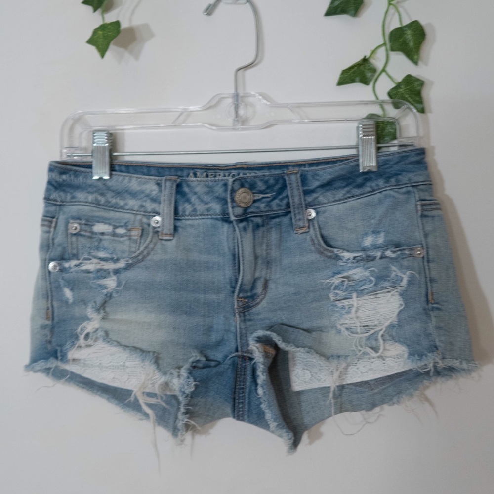 AE Low-Rise Frayed Denim Shorts w/ Lace Pockets
